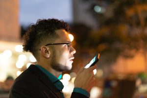 business-man-using-mobile-at-night