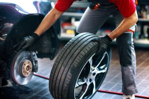 car-mechanic-replacing-a-tire