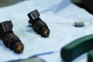 injector-cleaning-process-repair-service-car-auto-engine-close-up-selective-focus