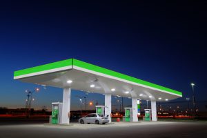 green-gas-station-lights-at-night