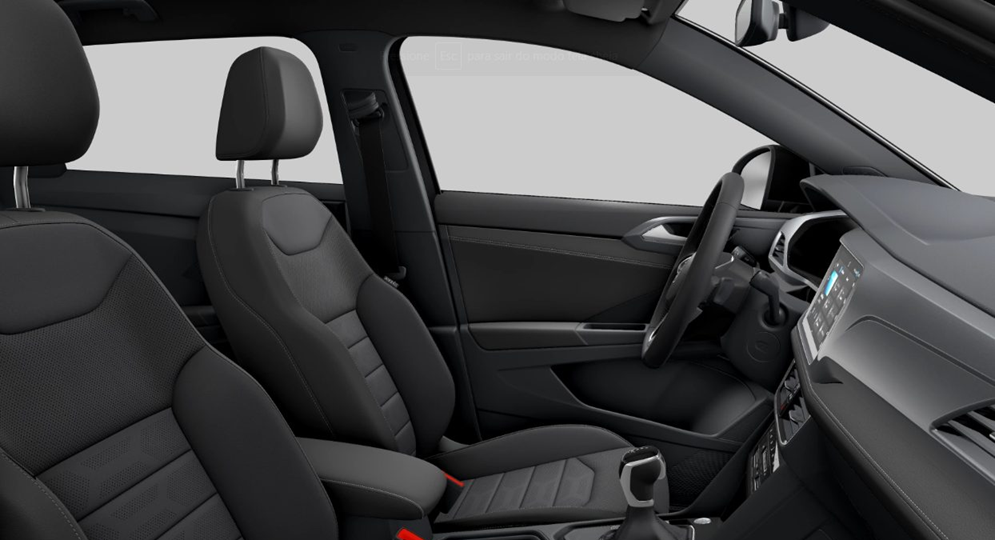 interior do Volkswagen Taos com foco no espaço, destacando a distância entre os bancos dianteiros e o volante.