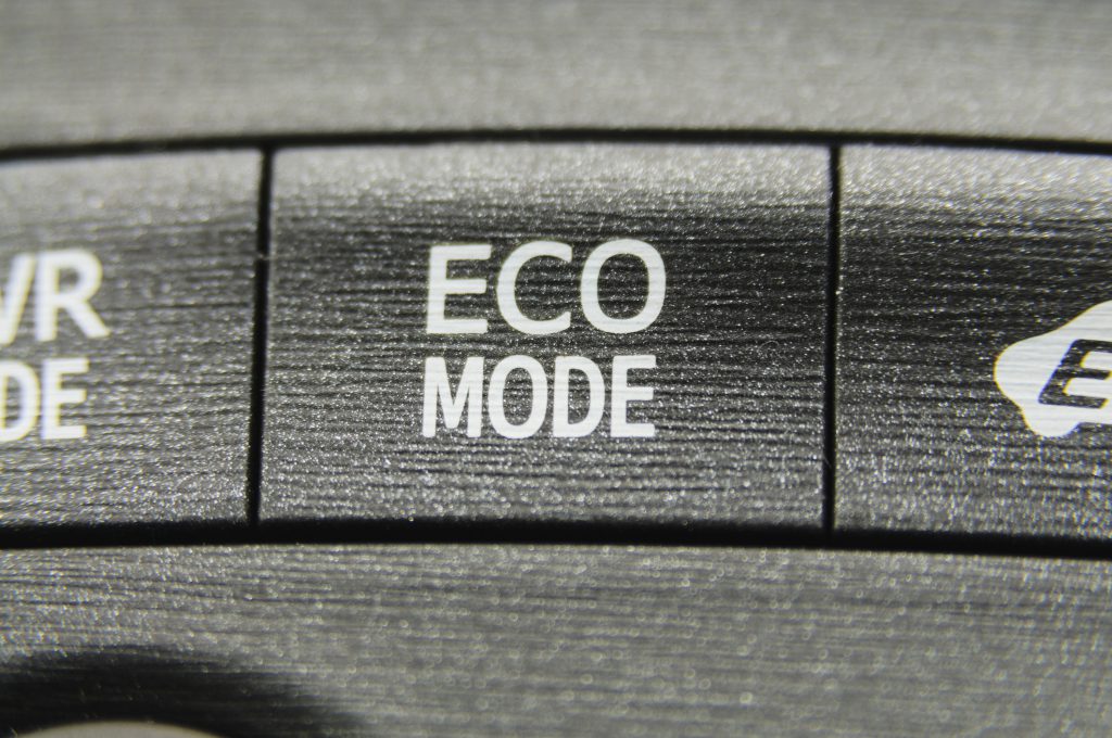Eco mode button on a petrol electric hybrid car
